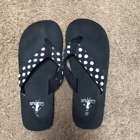 black and white polka dot flip flops